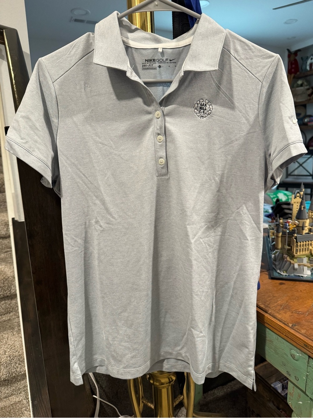 Women’s Nike Light Gray Golf Polo with Small Chest Emblem